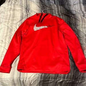 Red Nike hoodie selling because too small